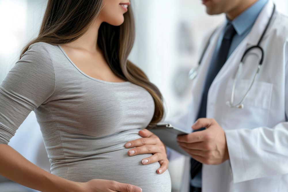 Pregnant woman with doctor stethoscope pregnant adult. AI generated Image by rawpixel.