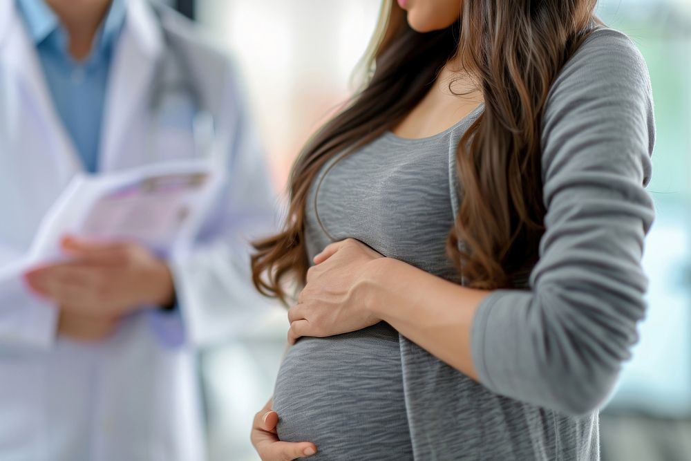Pregnant woman with doctor pregnant adult anticipation. AI generated Image by rawpixel.