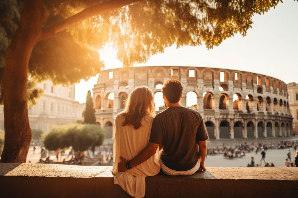 Tourist couple sitting on bench in rome adult togetherness architecture.