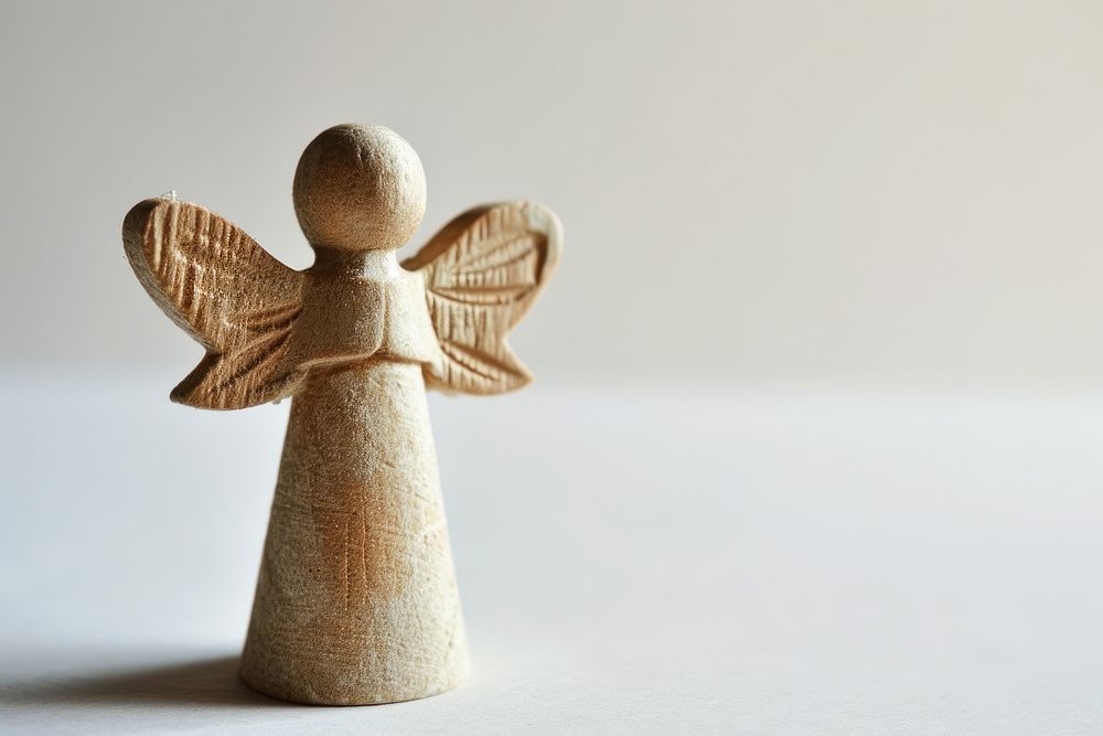 Angel figurine angel art. AI generated Image by rawpixel.