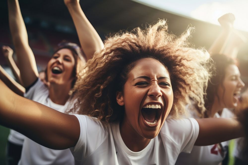 Cheerful team of female soccer players shouting cheerful laughing. AI generated Image by rawpixel.
