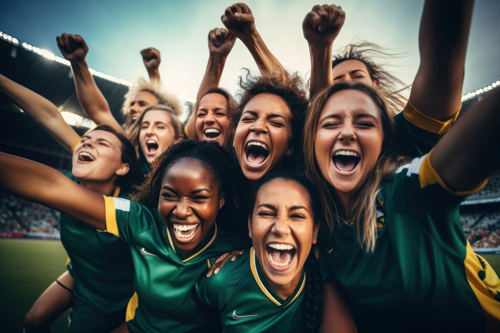 Cheerful team of female soccer players celebrating cheerful teamwork. AI generated Image by rawpixel.