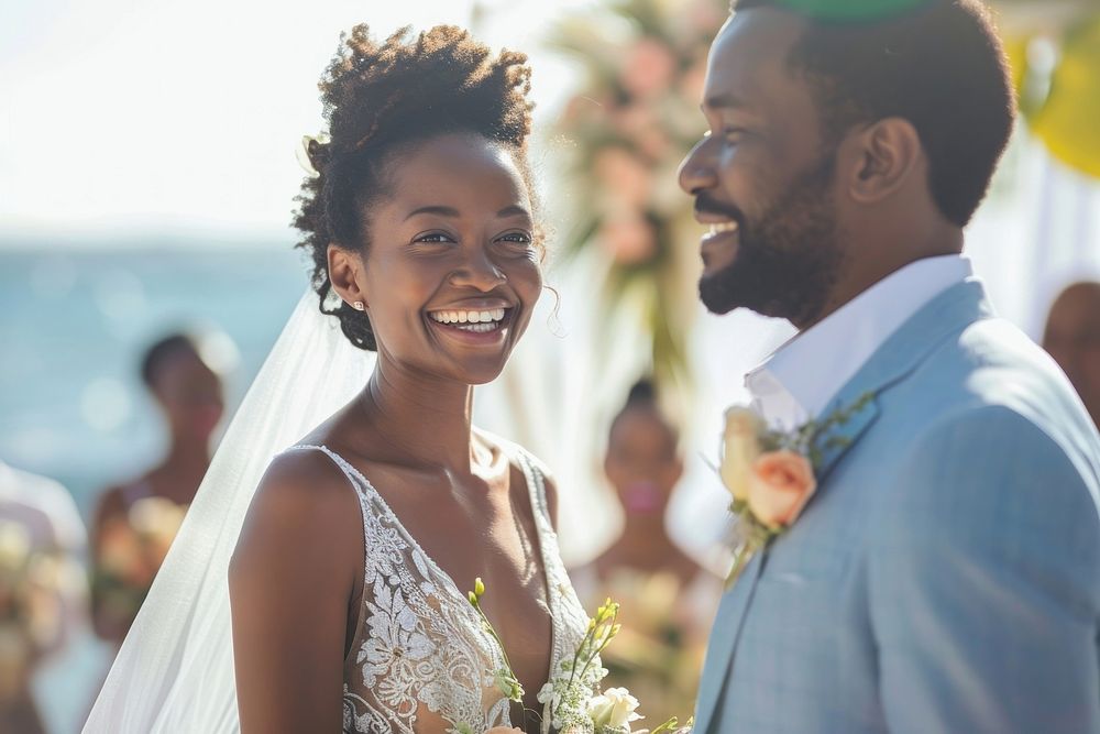 Happy black couple getting married at an island fashion wedding bride.