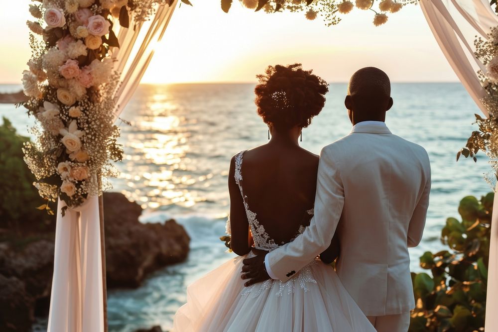 Happy black couple getting married at an island wedding bride adult.