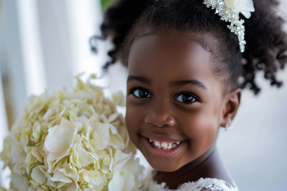 Happy black flower girl portrait wedding child.