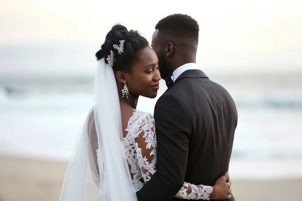 Happy black Groom and Bride at an beach bride wedding adult.