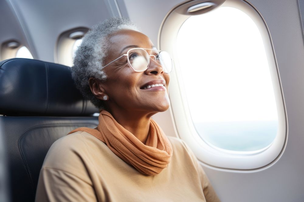 Elder african american woman airplane portrait looking.