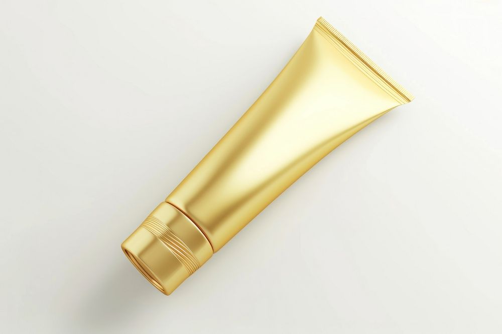 Cream tube cosmetics bottle gold.