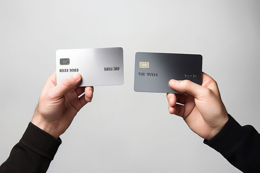 Credit cards holding hand technology. AI generated Image by rawpixel.