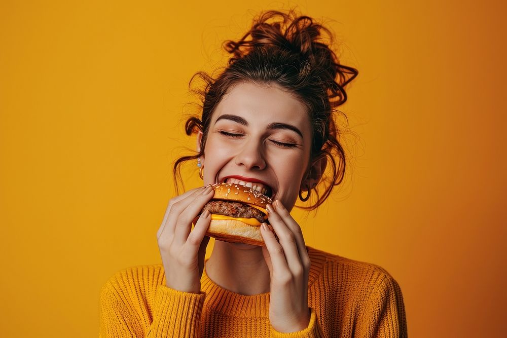 Burger eating biting burger. AI generated Image by rawpixel.