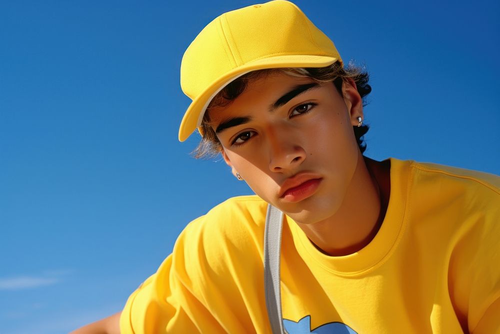Hispanic young boy playing sports portrait fashion yellow.