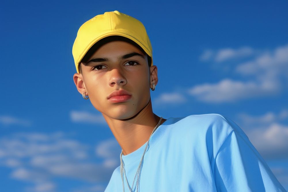 Hispanic young boy playing sports portrait fashion yellow.