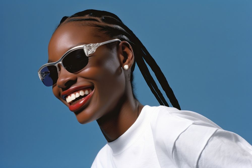 Black young woman smiling wearing a white sunglasses smile portrait fashion.