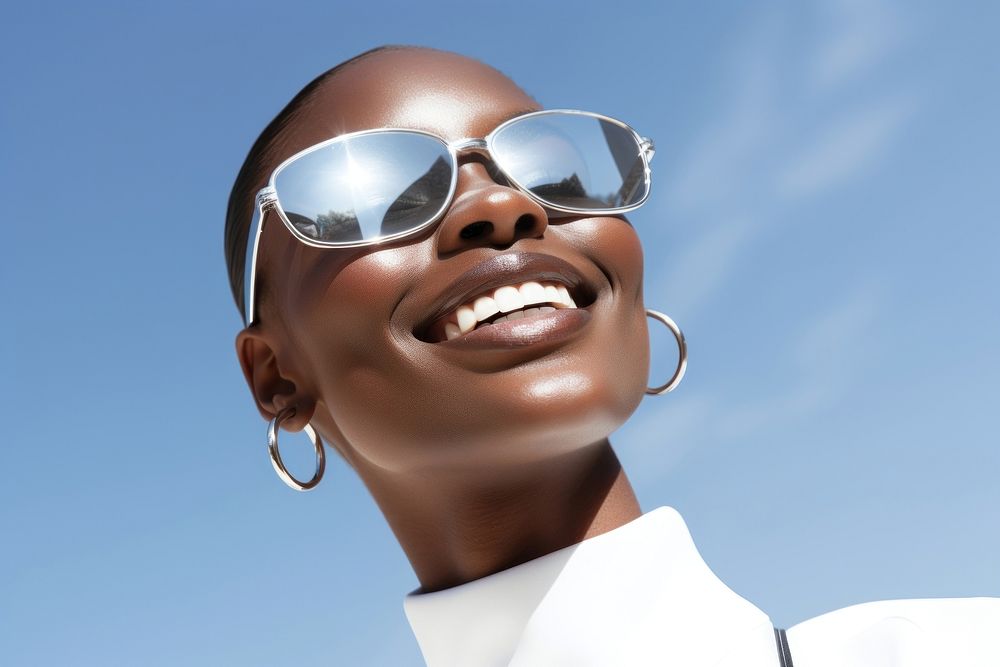 Black young woman smiling wearing a white sunglasses exposing her eyes smile fashion adult.