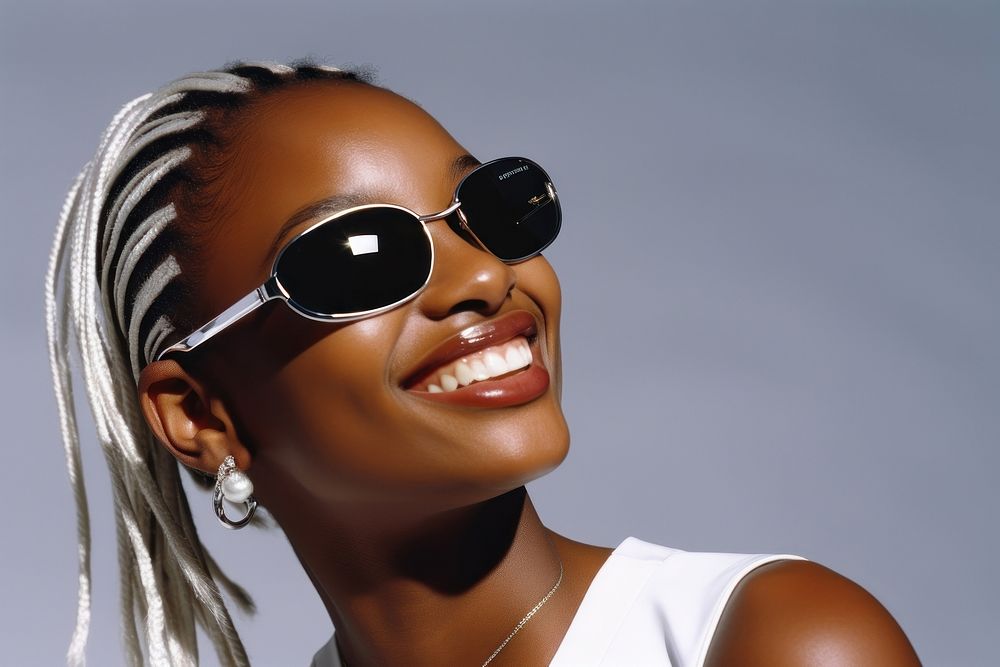 Blond hair black young woman smiling wearing a white sunglasses smile portrait fashion.