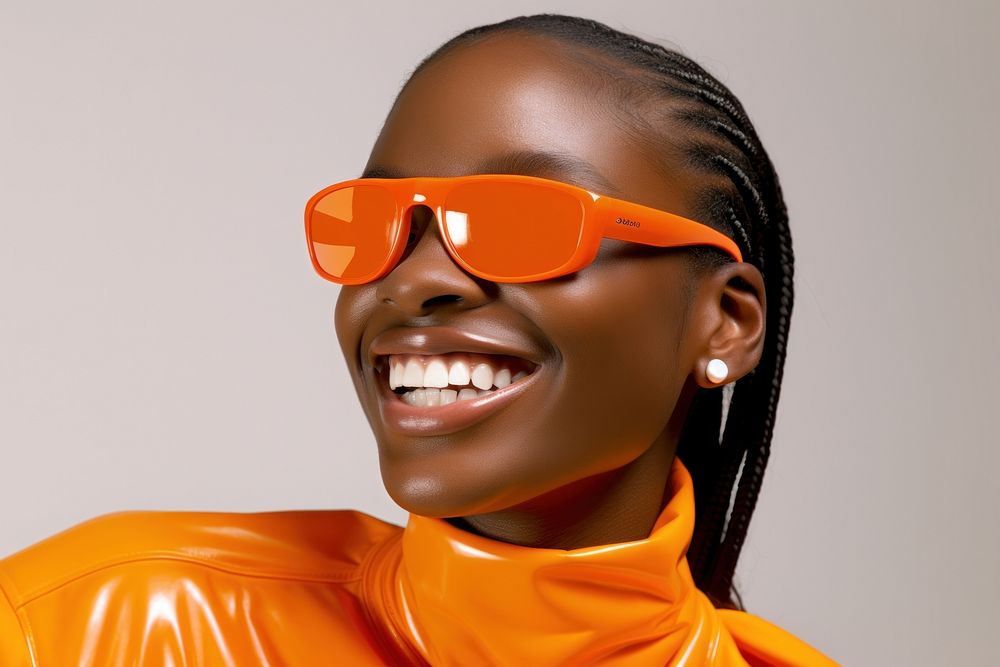 Blond hair black young woman smiling wearing a white sunglasses exposing her eyes smile fashion accessories.