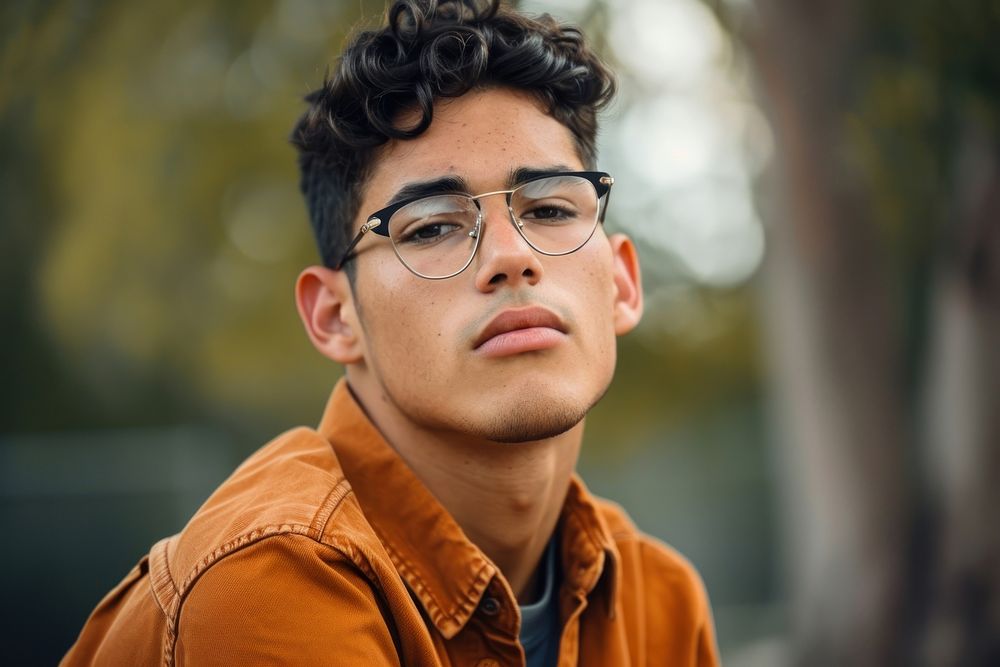 Hispanic young man portrait glasses adult.