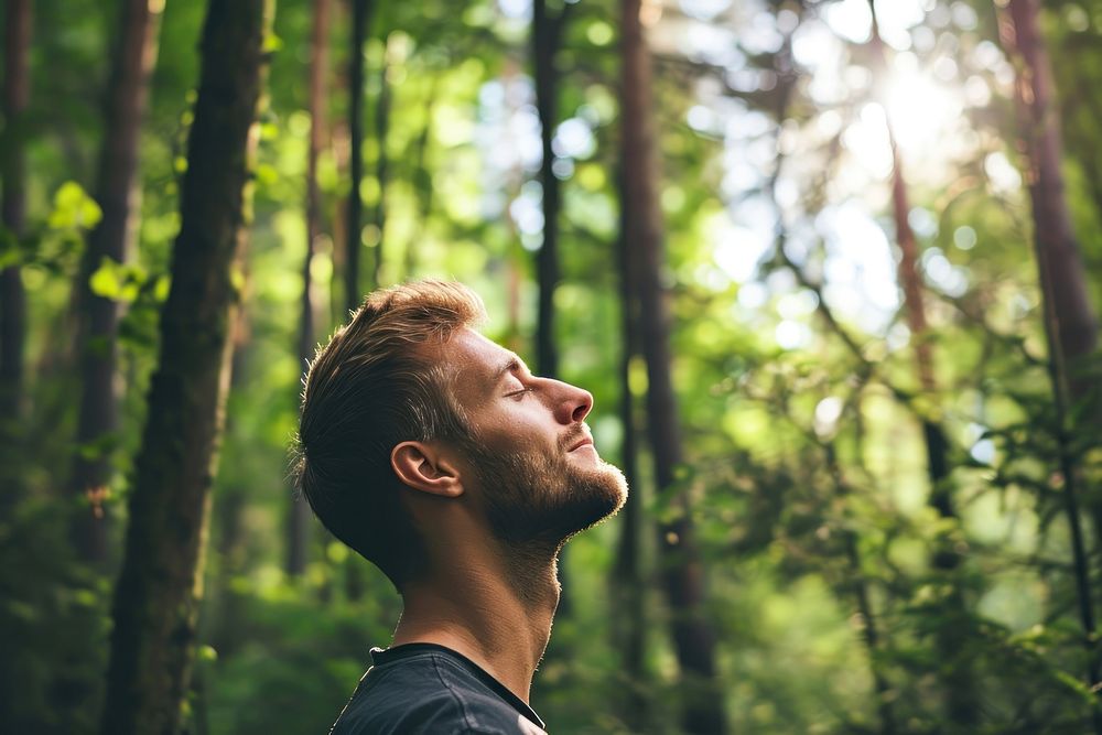Relaxed adult man forest tree outdoors. AI generated Image by rawpixel.
