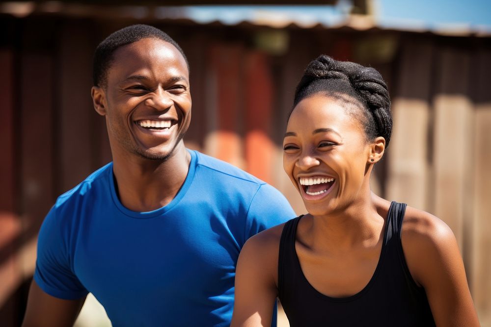 African exercising laughing smiling.