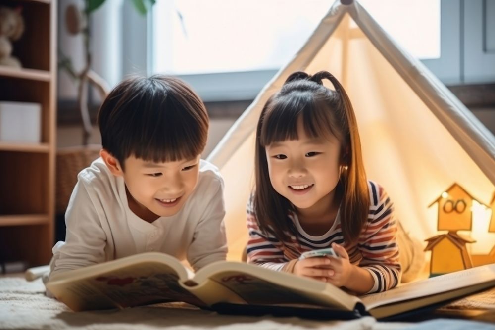 The two asian kids publication reading child.