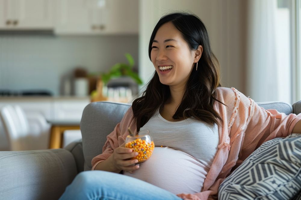 Pregnant asian woman smiling sitting adult.
