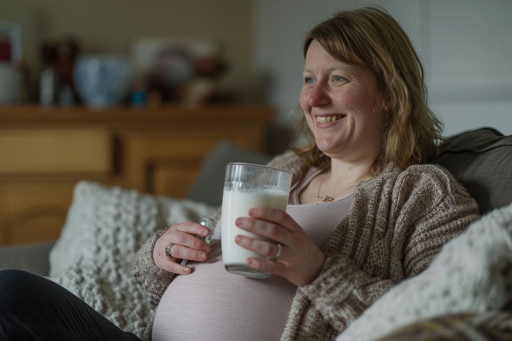 Pregnant british woman drink milk drinking.