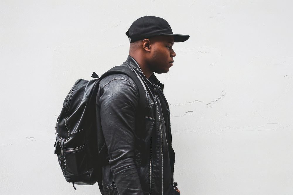 Black man young American African man photography backpack. AI generated Image by rawpixel.
