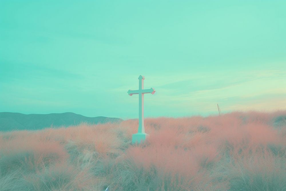  A Christ cross amidst tall grass on a hill background outdoors nature symbol. AI generated Image by rawpixel.