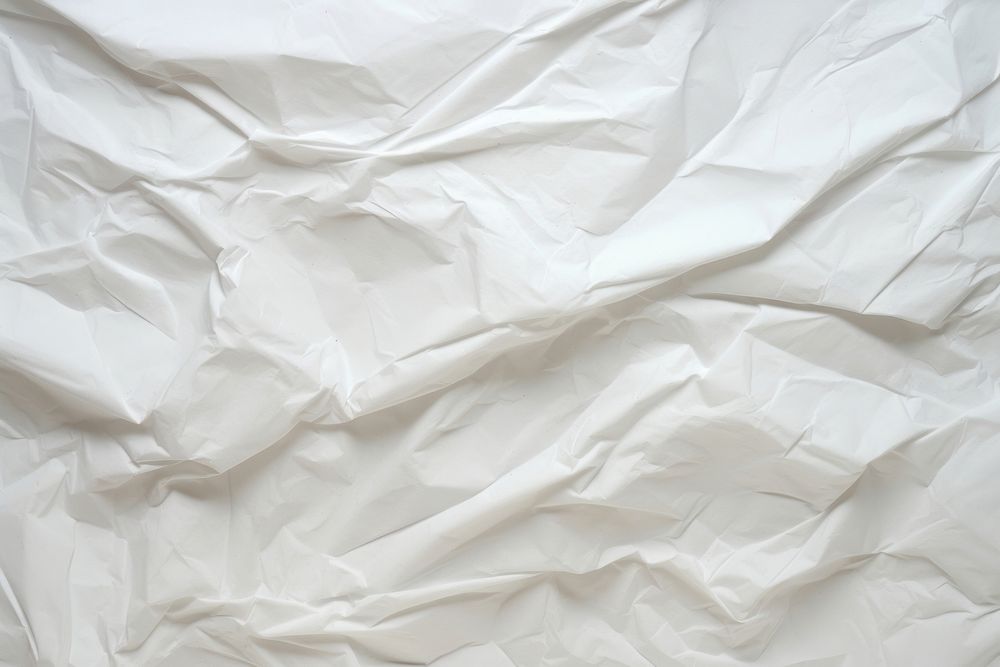 Recycled crumpled white paper backgrounds copy space wrinkled.