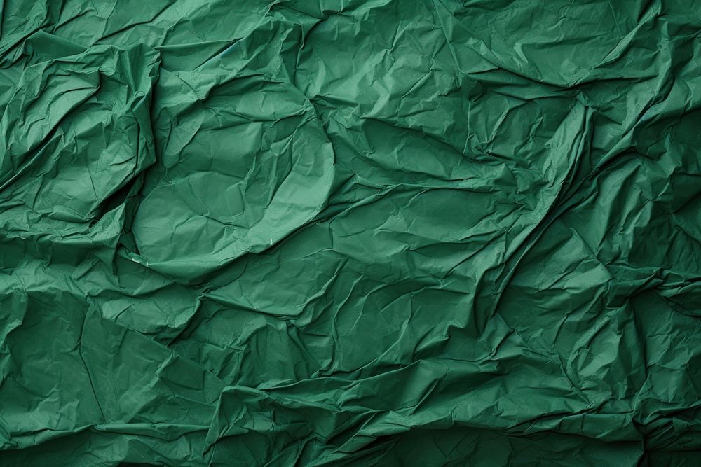 Recycled crumpled green paper backgrounds texture textured.