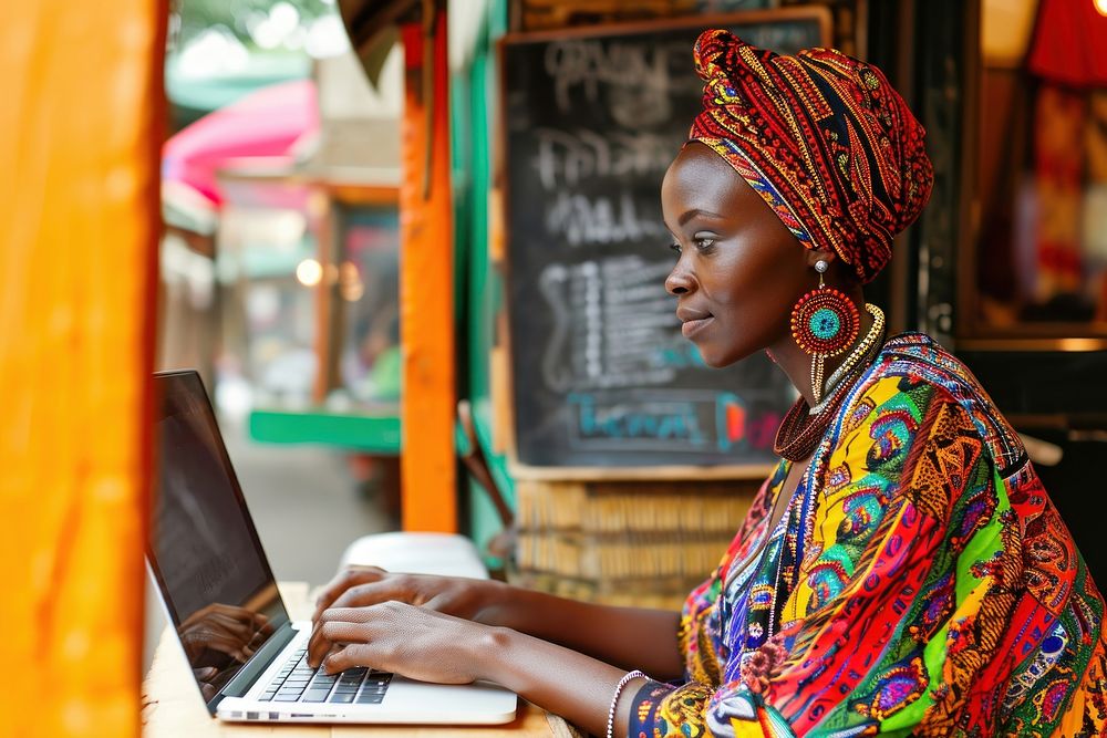 African woman laptop computer looking.