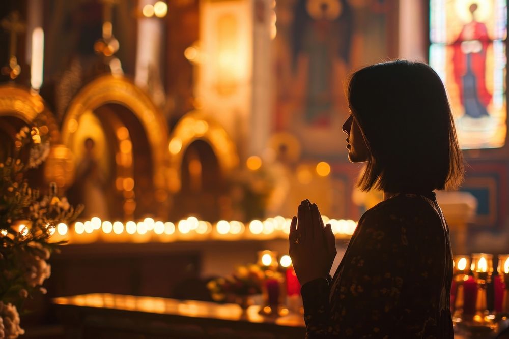 Christian woman praying adult spirituality architecture. AI generated Image by rawpixel.