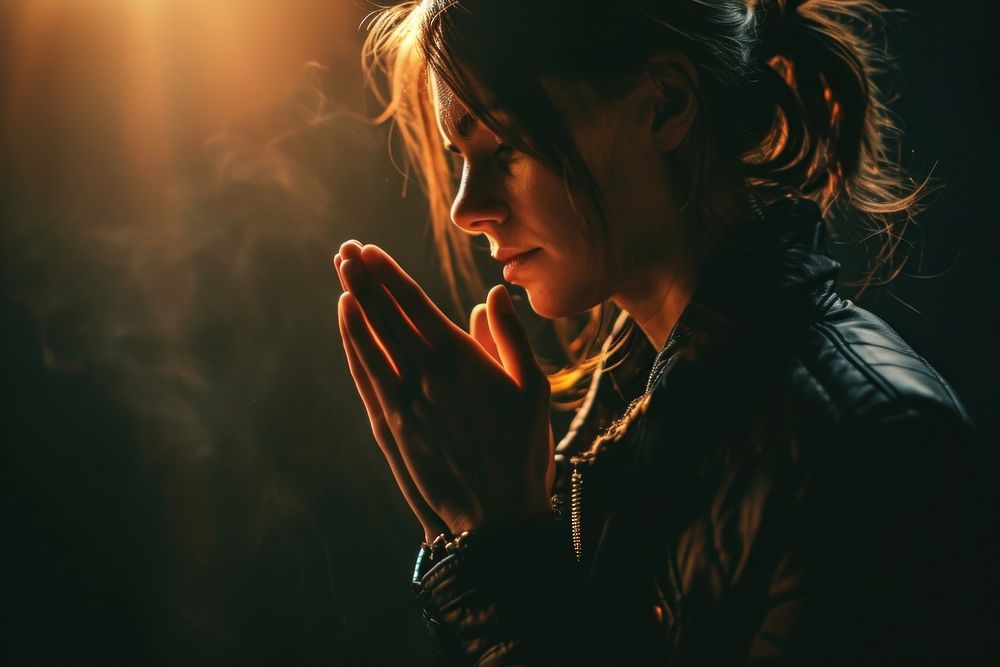 Christian woman praying portrait adult photo. AI generated Image by rawpixel.