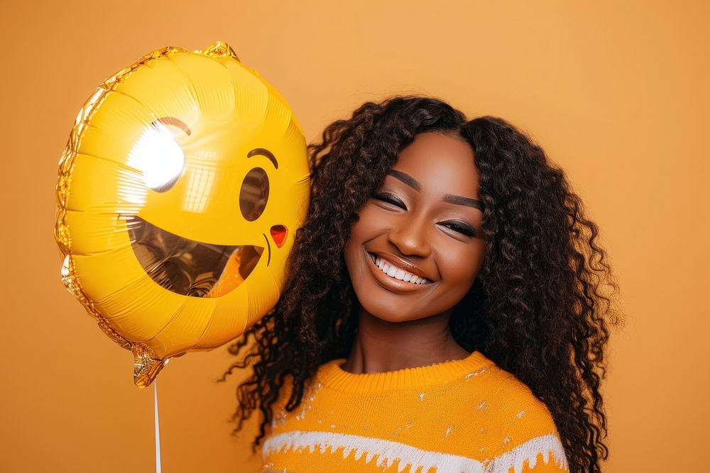 African woman balloon adult smile.
