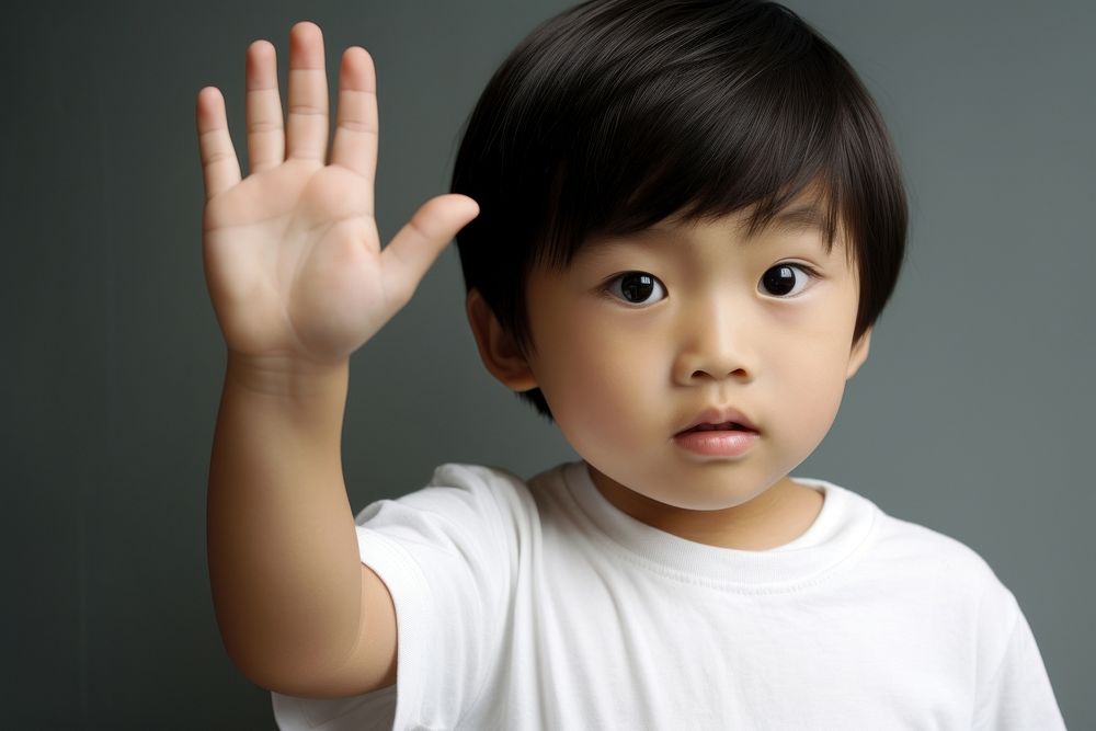 Raising one hand up portrait finger child.