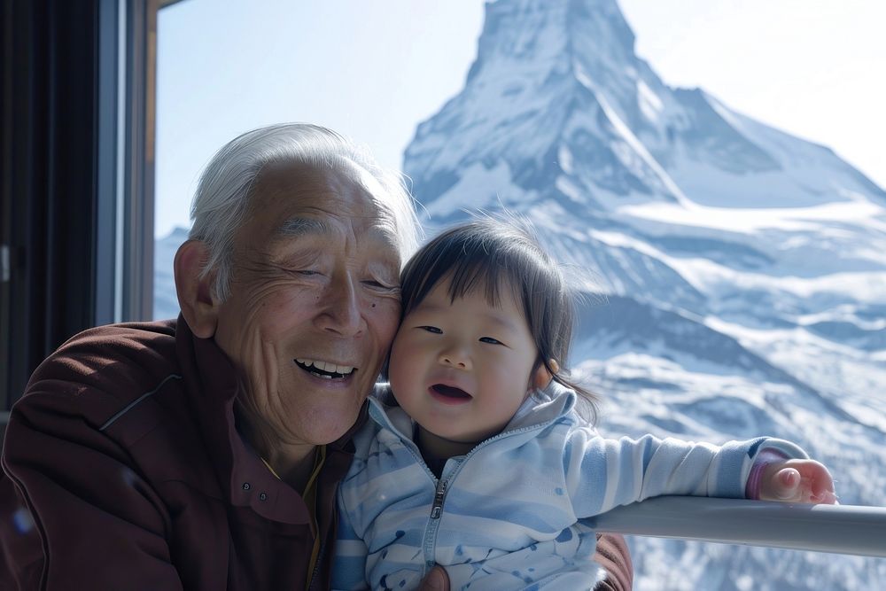 Matterhorn mountain grandparent grandchild portrait.