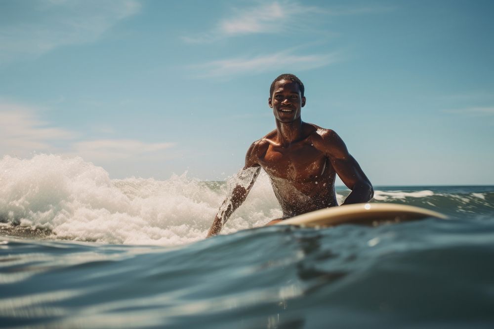 African man sea outdoors surfing.