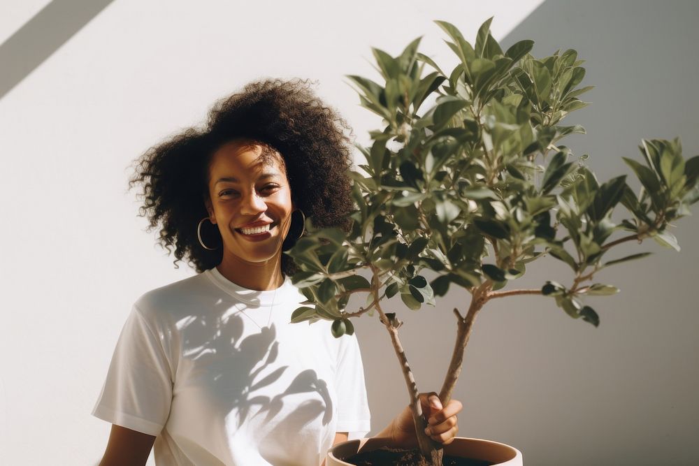 Black woman plant adult white.