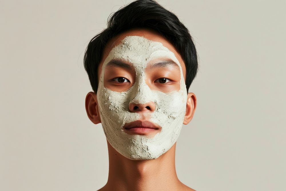 South east asian man with a face mask portrait photography studio shot.