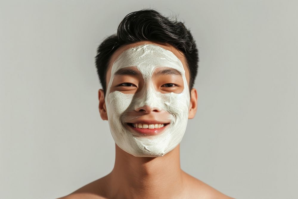 South east asian man with a face mask portrait photography smiling.