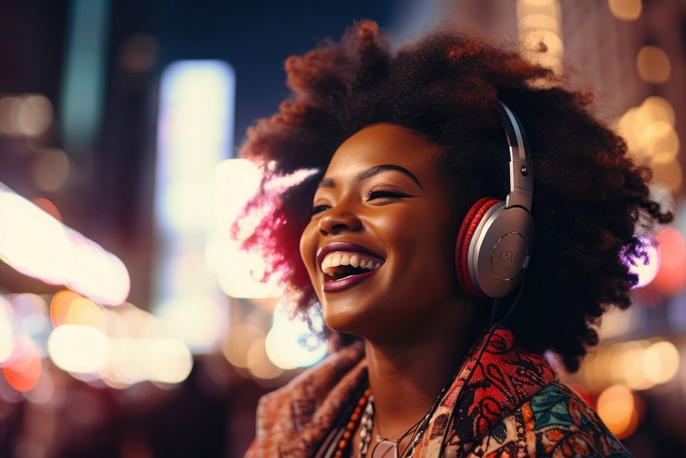 African woman wearing headphone headphones headset smile.