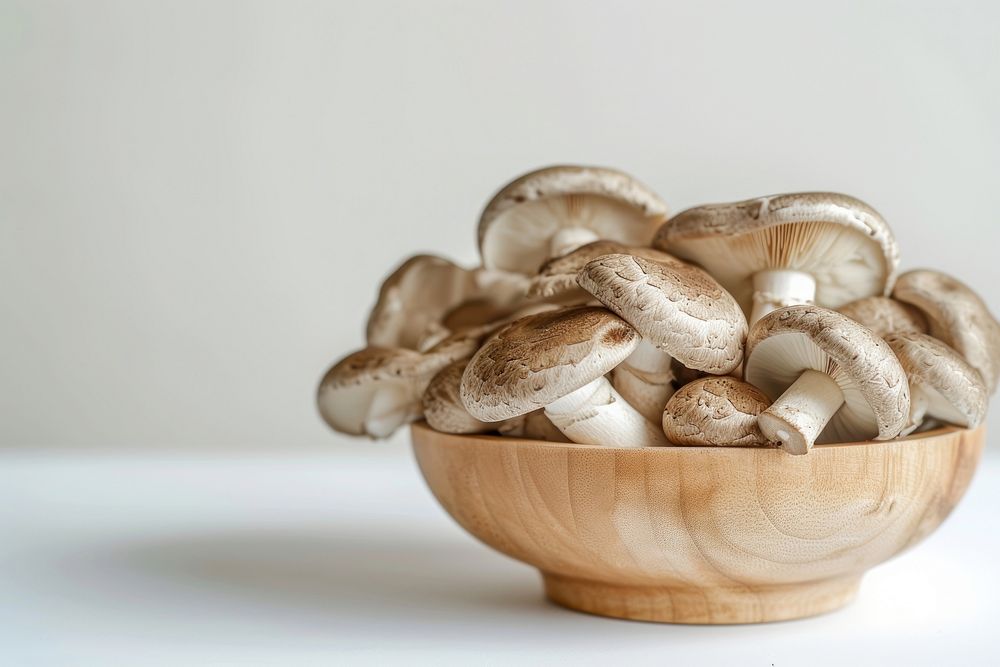 Mushroom on bowl agaricaceae ingredient vegetable.