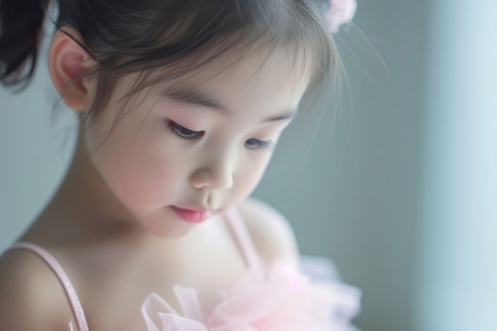 Extreme close up of little asian girl ballet photography portrait child.