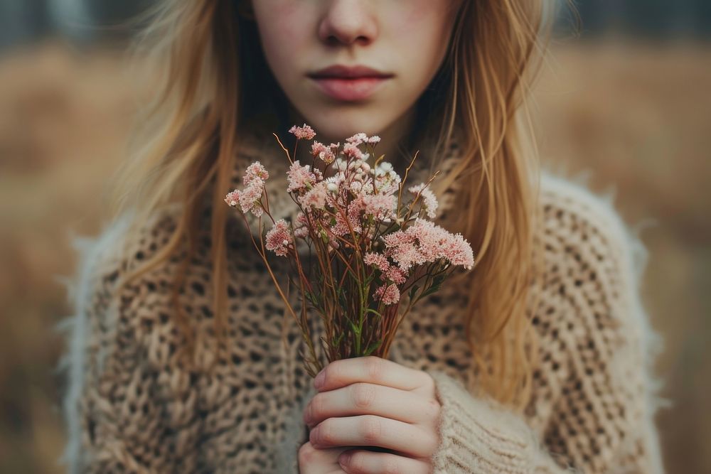 Extreme close up of person holding flowers photography portrait plant.
