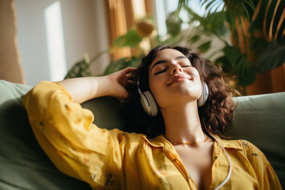 Woman with headphone close her eyes enjoying music headphones person adult.
