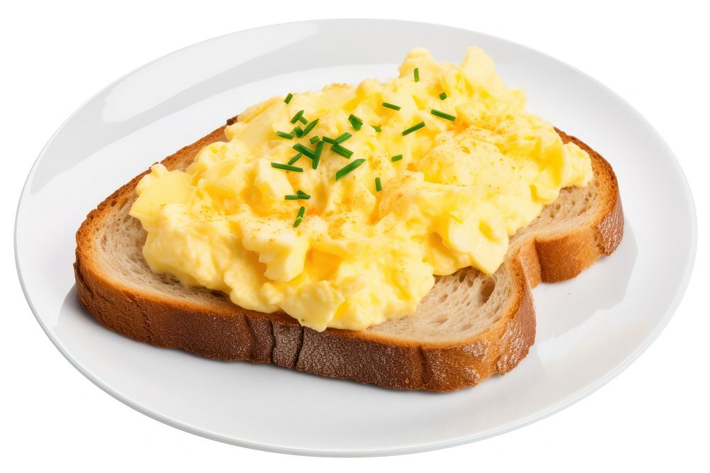 Scrambled eggs on sourdough toast bread plate food.