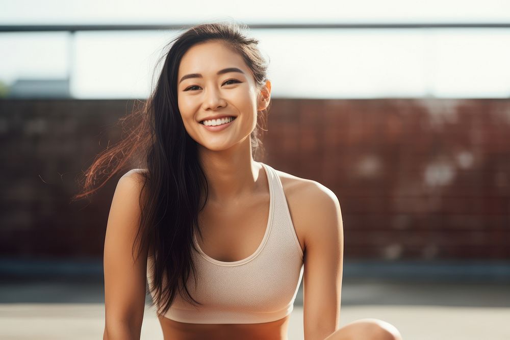 Asian woman sports person smile.