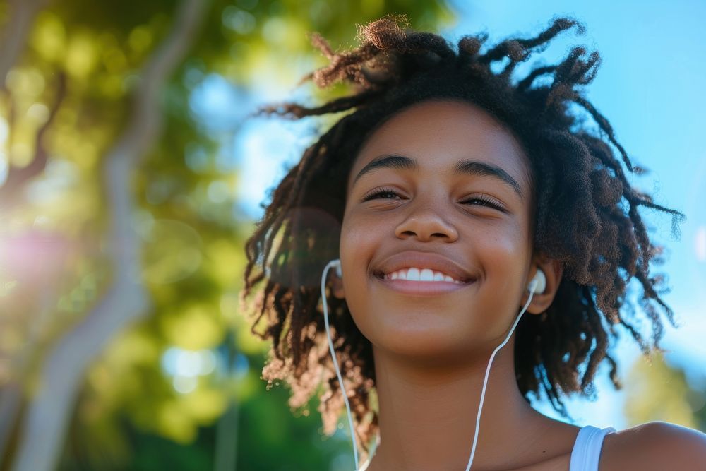Black teen woman listening music person smile day.
