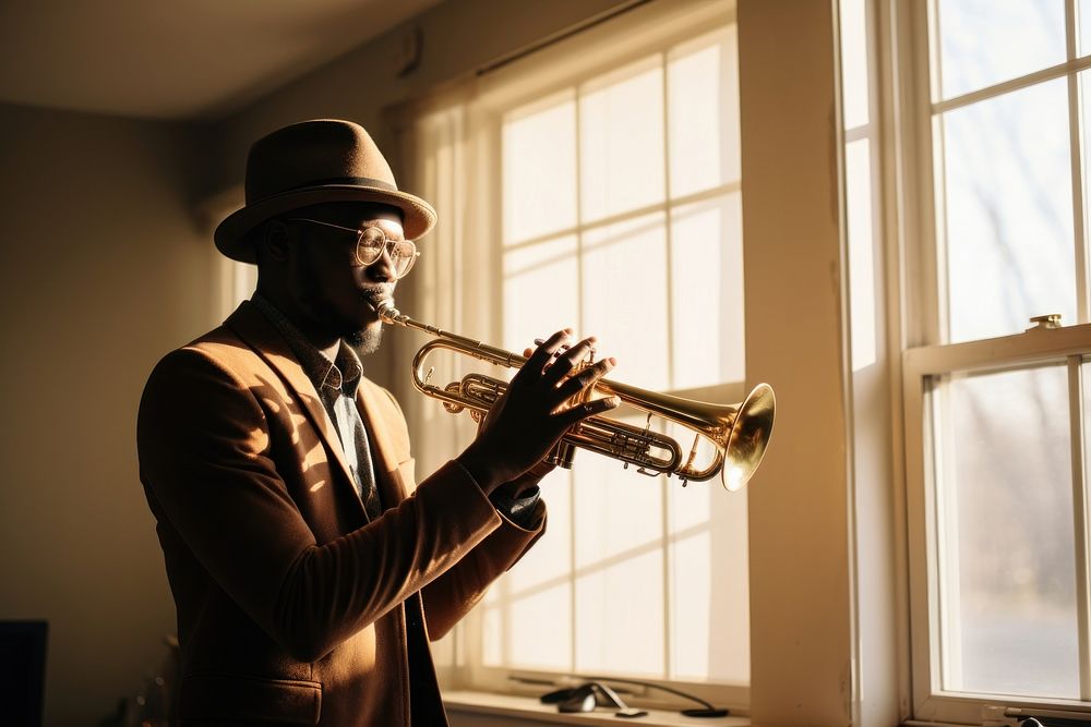 Black man playing trumpet musician person adult.