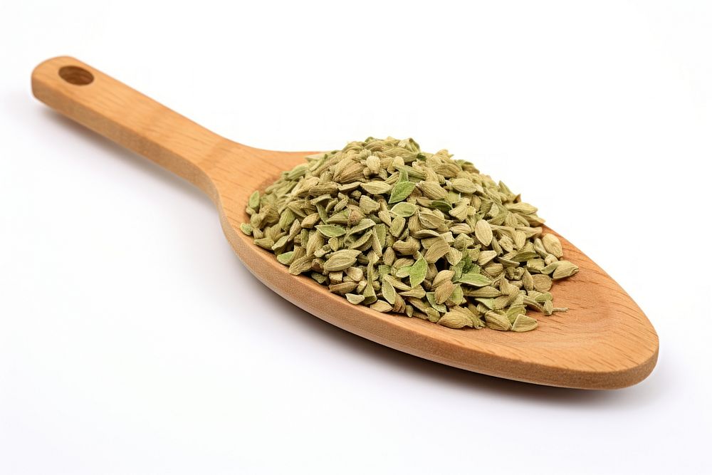 Dried oregano chopped on wooden spoon spice food ingredient.